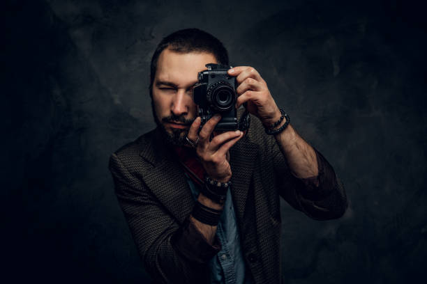 istock Reporter is taking a photo at photo studio 1206223894