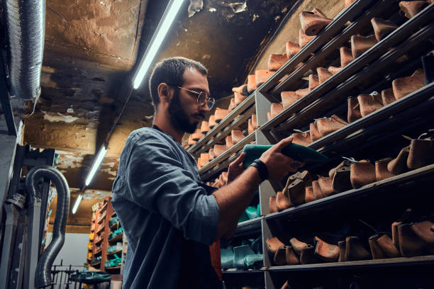 istock Cobbler is looking for right shoe form 1206225140