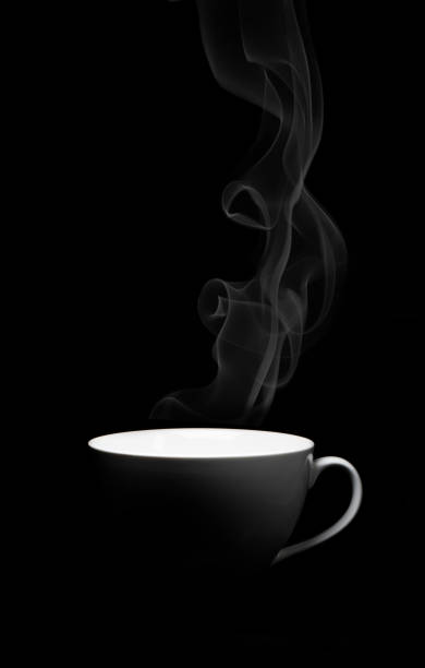 istock white porcelain cup on black background with smoke 1206228647