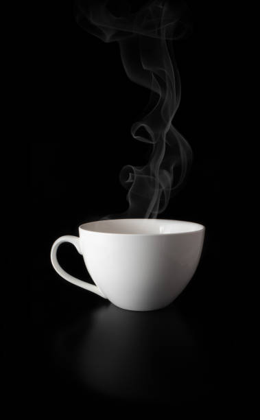 istock white porcelain cup on black background with smoke 1206228650
