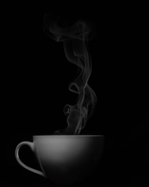 istock white porcelain cup on black background with smoke 1206228663