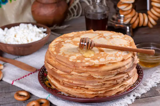 Thin homemade pancakes. Russian bliny. Maslenitsa. Rustic style, close up view