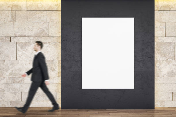 istock Businessman walking in gallery 1206233952