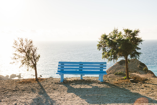 Blue Bench against evening sun on Karpathos