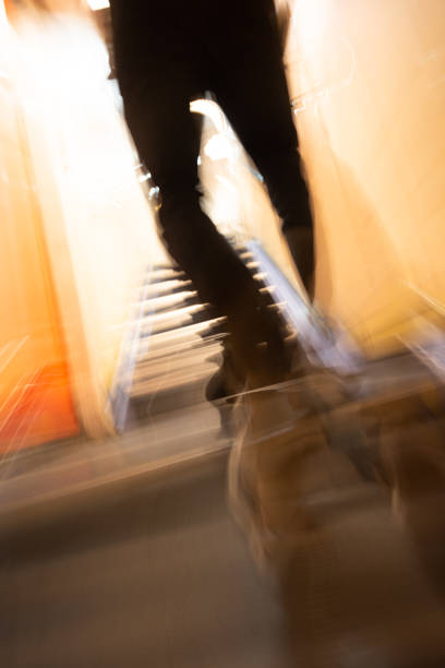 istock Abstract man walking up the stairs 1206237295