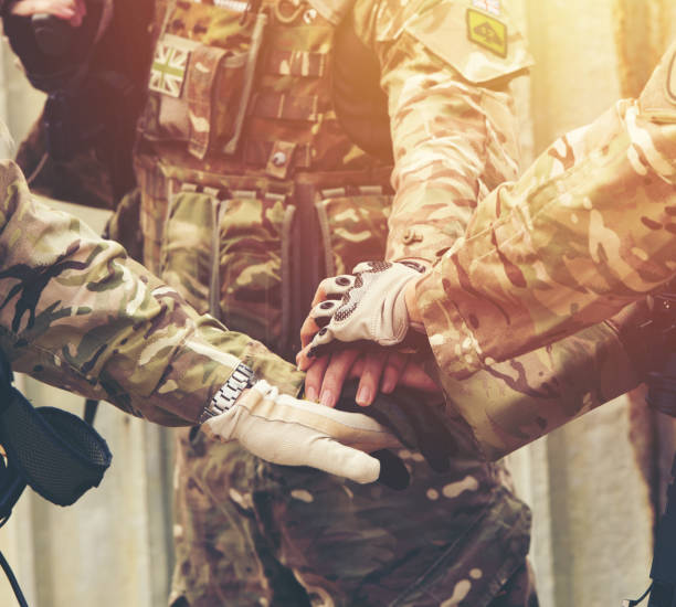 istock together collaborate of hands teamwork soldier 1206237683
