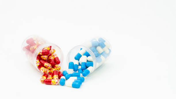 istock medical drug capsule with bottle on white background 1206239119
