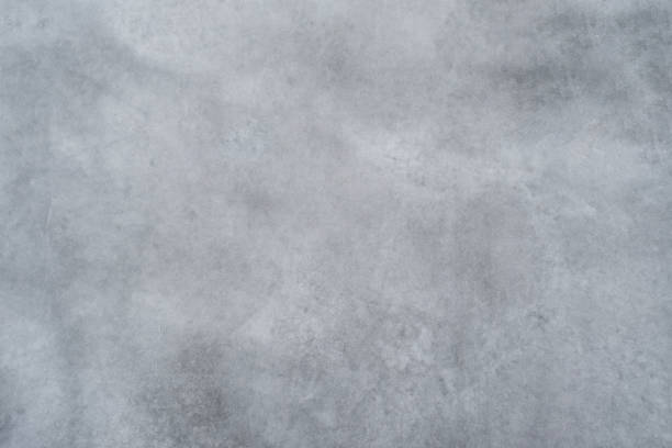 istock Texture of a smooth gray concrete wall as a background 1206240668