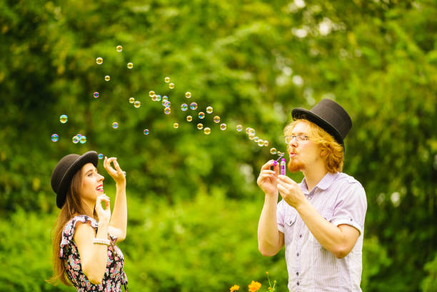 istock Couple blowing bubbles outdoor 1206240829
