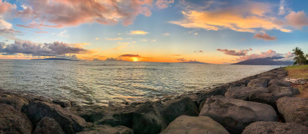 istock sunset panoramic view at a beach in Maui, Hawaii 1206240957