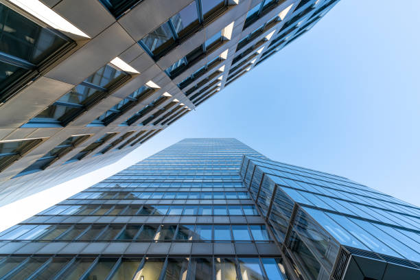 istock Low angle view of skyscrapers with blue sky 1206246773