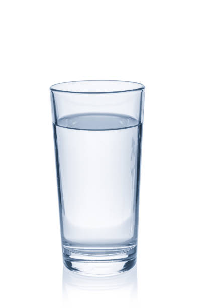 istock Water glass close up on white background 1206248074