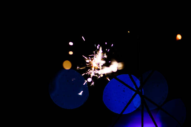 istock Sparks in the dark. Sparks. Christmas and New Year time. Magic light 1206248675