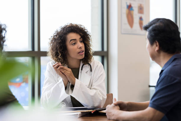 istock When senior man asks question, doctor listens carefully 1206252719