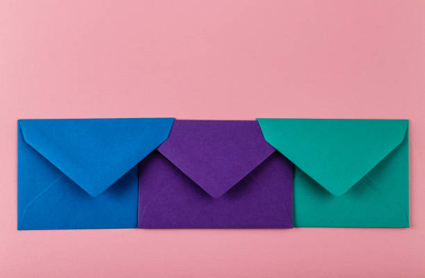 istock Colorful envelopes on a pink background. 1206256392
