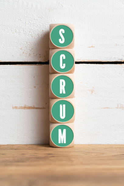 cubes with message SCRUM cubes with message SCRUM in front of wooden background scrum stock pictures, royalty-free photos & images