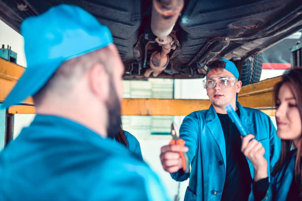 istock Students Answering Which Tools Are Needed To Fix Car Exhaust To Professor 1206259675