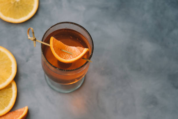 istock Spritz cocktail with oranges and ice in wine glass 1206260521