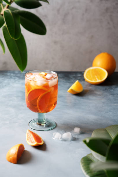 istock Spritz cocktail with oranges and ice in wine glass 1206260664