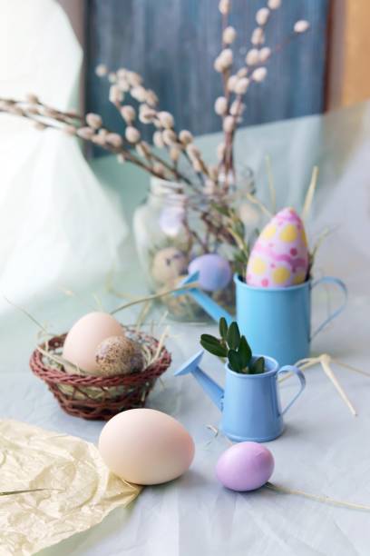 istock Easter decoration, eggs, pussy-willow branches on a wooden surface 1206261587