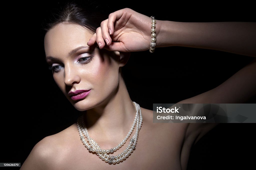 Beauty with pearl jewelry Beautiful woman with pearl jewelry Adult Stock Photo