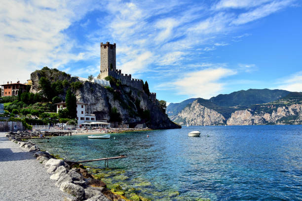 istock A medieval lakeside castle with fortified walls. 1206265735