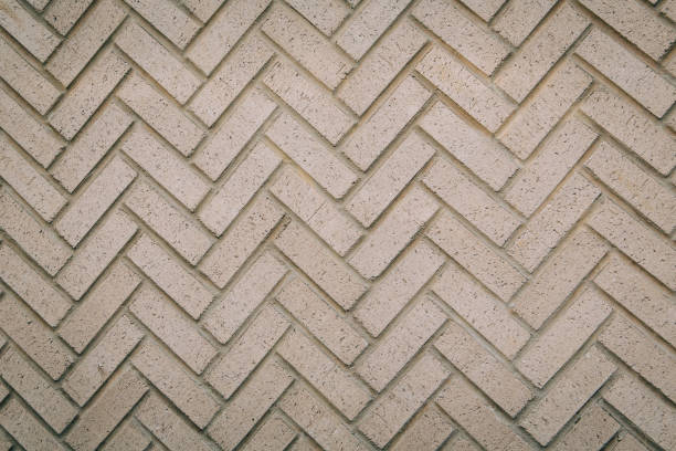 istock a herringbone pattern brick wall in a neutral beige brown color 1206267259