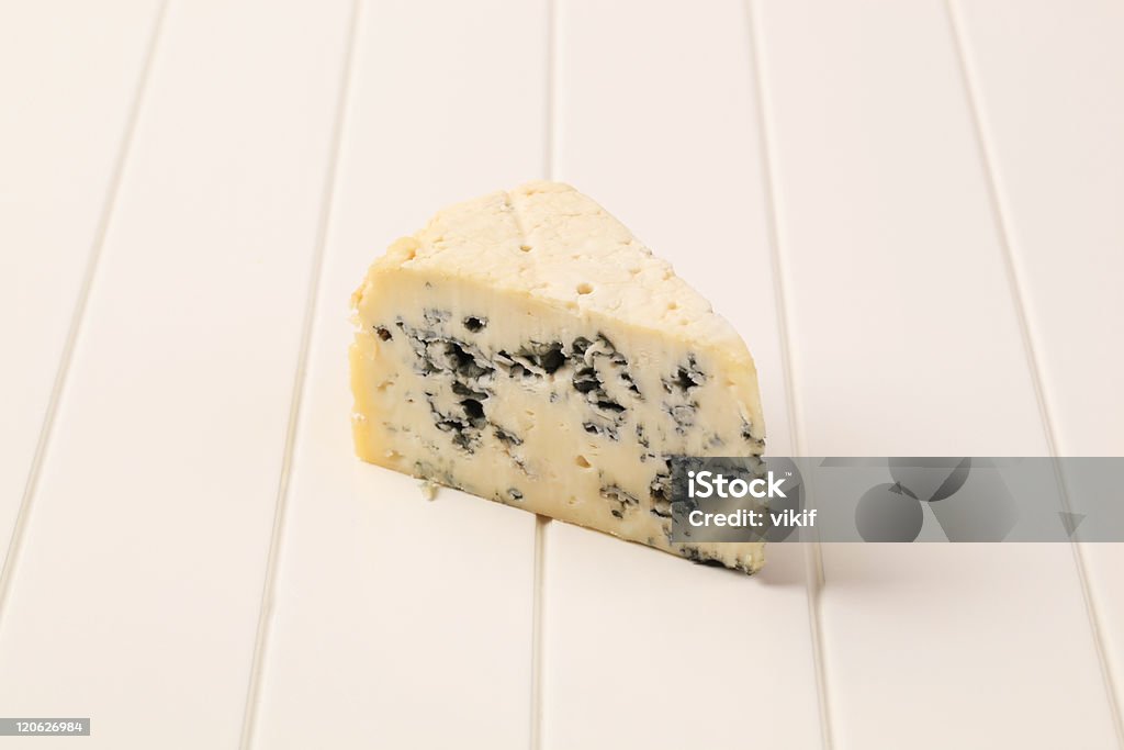 Blue cheese Wedge of blue cheese - studio shot Blue Cheese Stock Photo