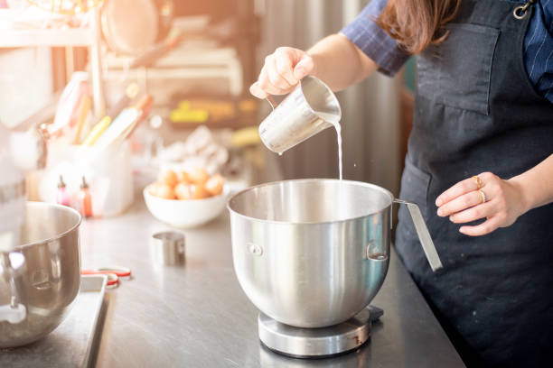 istock Beautiful woman is making bakery 1206271022