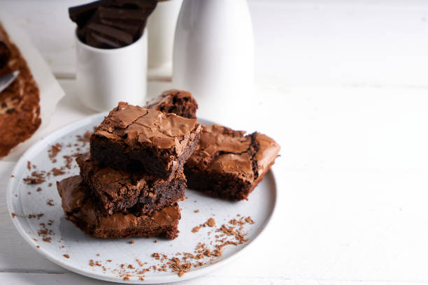 istock Brownie chocolate cake served on white table 1206271551