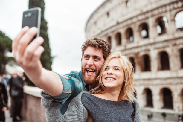 istock young tourist take a selfie in Rome 1206283610