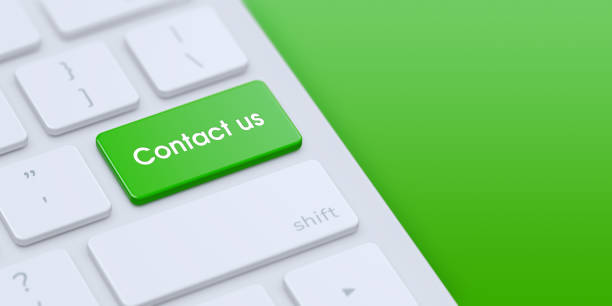 istock Keyboard with green Contact us key 1206284576