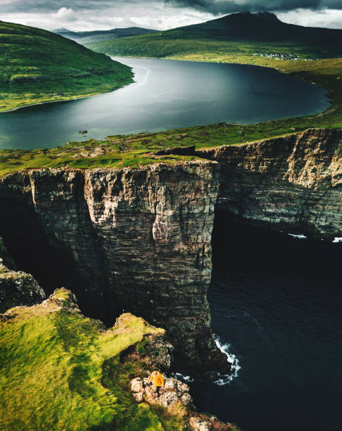 istock hiker on top of the Faroe Islands 1206287491