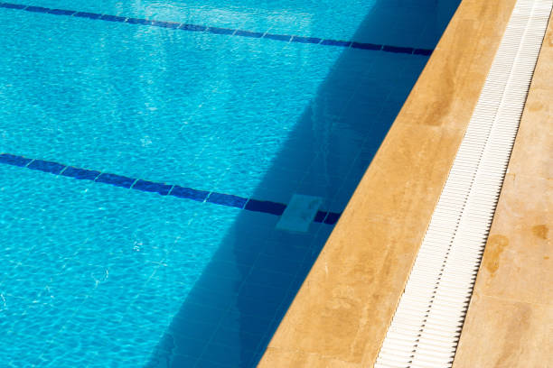 istock Pool side background with copy space. Swimming pool during sunny day. 1206290202