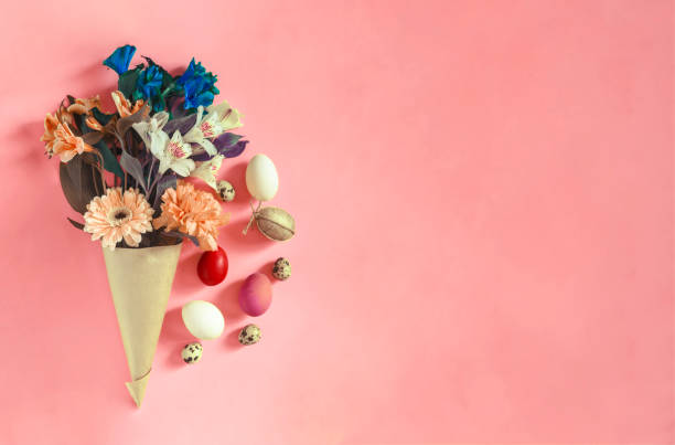 istock Bright spring flowers bouquet with colorful Easter eggs 1206297711