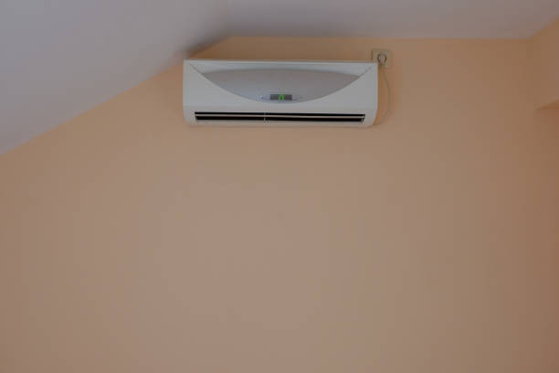 istock air conditioning on the wall with a sloping roof 1206298966