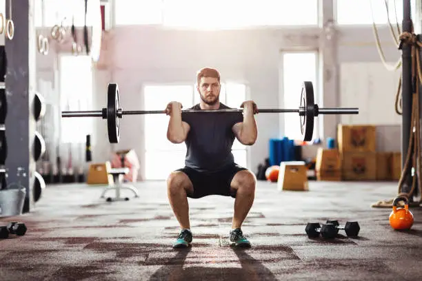 Young man exercising in the gym