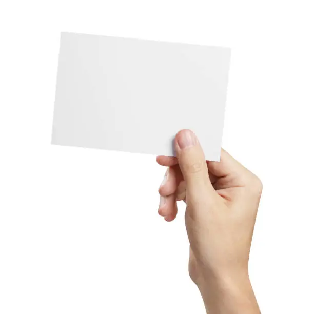 Hand holding blank card 10x15cm, isolated on white background