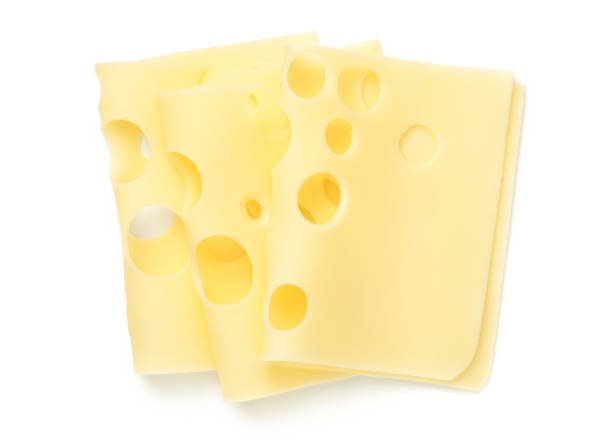 白い背景に隔離されたエメンタールチーズスライス - swiss cheese ストックフォトと画像