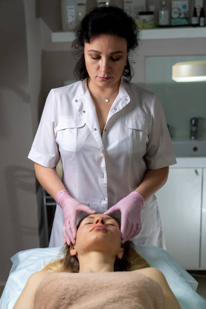 istock beautician makes procedure for a girl with problem skin 1206306988