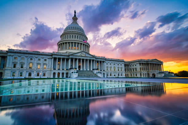 Dramatic sunset over the US capitol in Washington DC Dramatic sunset over the US capitol in Washington DC capitol building washington dc stock pictures, royalty-free photos & images