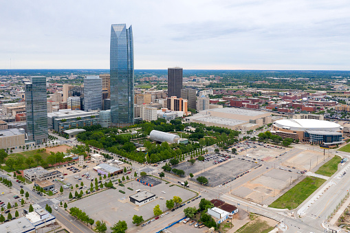 Oklahoma City, Oklahoma, USA, metropolitan area, central business district with Devon Tower, Oklahoma's tallest building, and Myriad Botanical Gardens.
