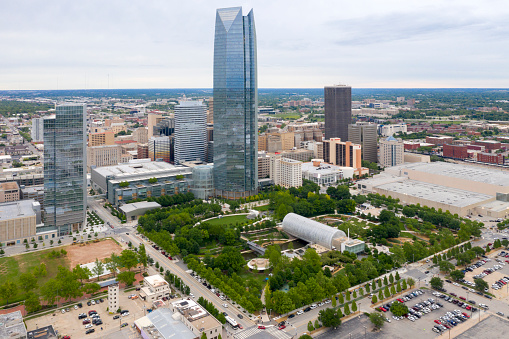 Oklahoma City, Oklahoma, USA, metropolitan area, central business district with Devon Tower, Oklahoma's tallest building, and Myriad Botanical Gardens.