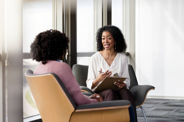 istock Therapist gives advice to female patient 1206311507