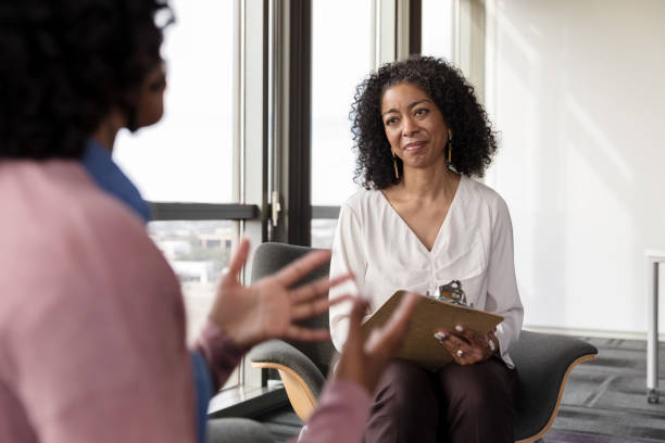istock Attentive counselor listens to patient 1206311509