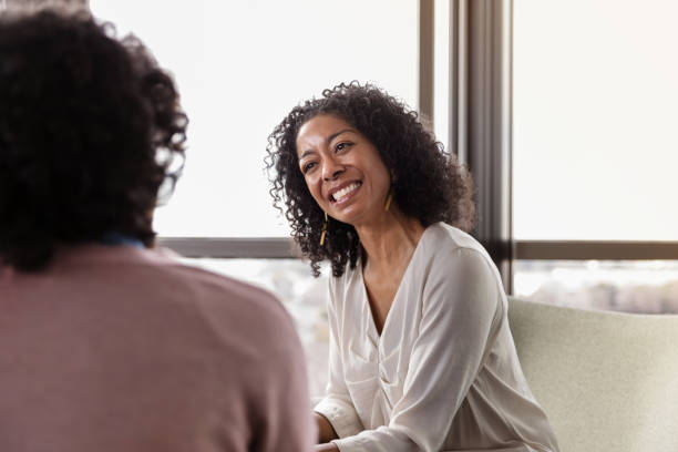 istock Attentive counselor listening to vulnerable patient 1206311524