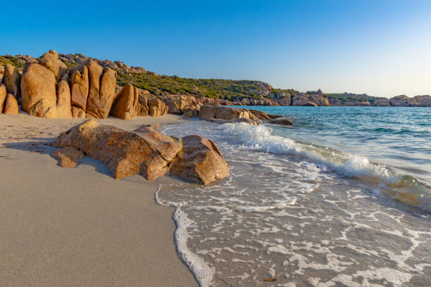 Eroded red granitic rocks on the 'Plage d'Argent', Corsica, France stock photo