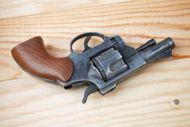 istock Revolver on the wooden table 1206318824