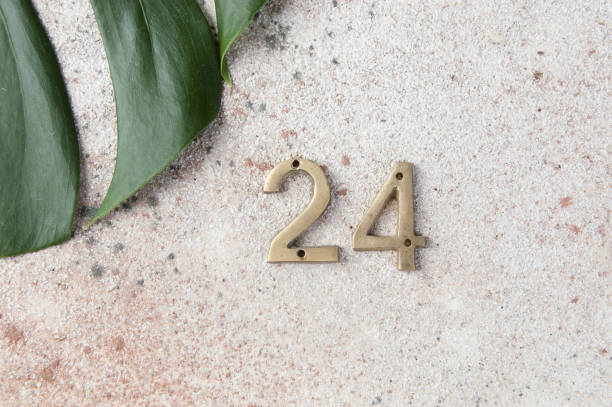 istock Antique door numbers on concrete background 1206324244