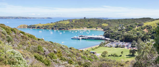 High angle view of Waiheke's Island ferry terminal during a summer day High angle view of Waiheke's Island ferry terminal during a summer day in Auckland, Auckland, New Zealand sound port stock pictures, royalty-free photos & images